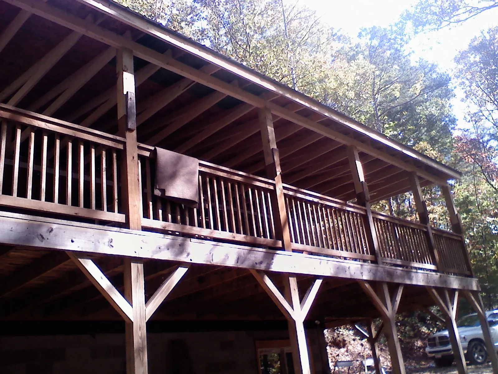 Timber framing under a new elevated porch and deck — Roof Leak Repair in South Richmond Hill by Roofing Brothers